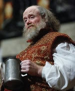 James Keegan as Falstaff holding a tankard in Henry IV, Part 1